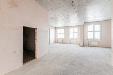 rough repairs for self-finishing. interior decoration, bare walls of the room, stage of construction