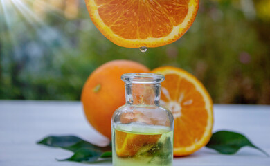 Essential oil extract of orange oil. Selective focus.