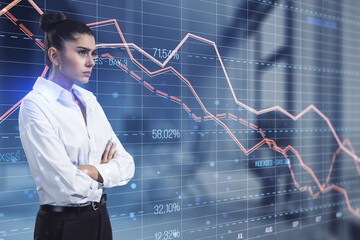 Attractive pensive young european businesswoman looking at glowing downward red forex chart on blurry office interior background. Crisis, and stock market fall concept. Double exposure.