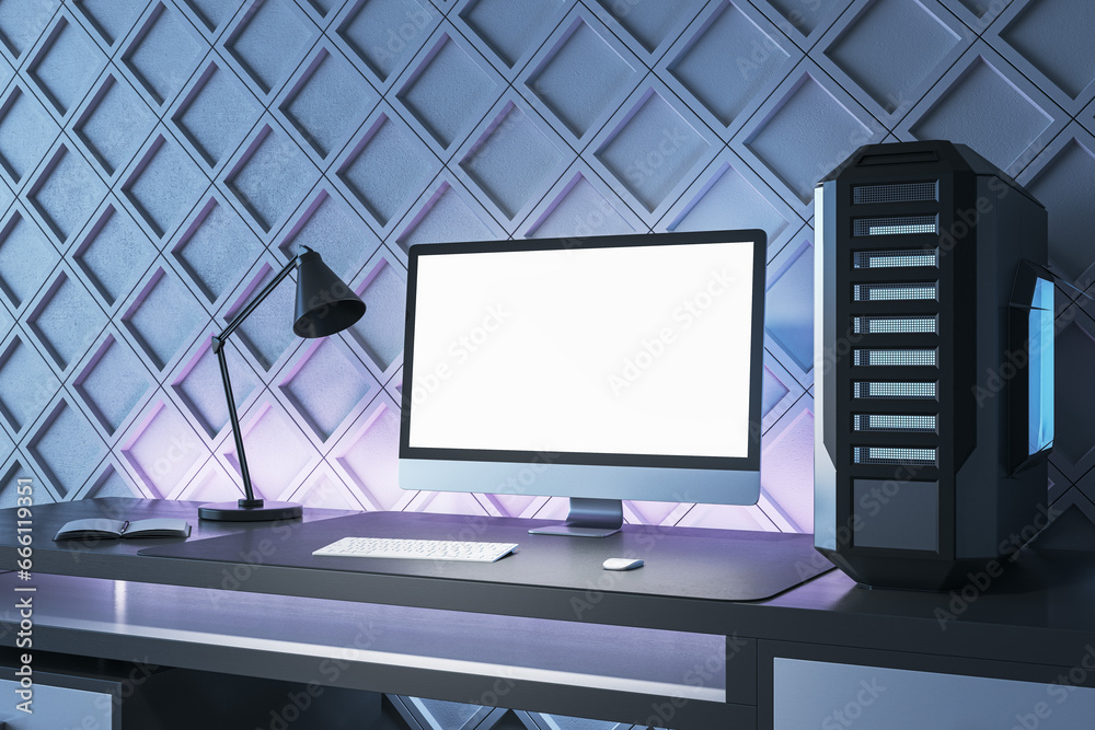 Poster creative gamers desktop with empty white computer screen, lamp and system unit on decorative blue wa