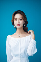 Fototapeta premium Young beautiful Asian girl wearing a white dress, cute, innocent and attractive looks, generative ai.