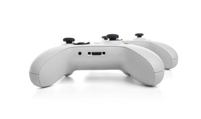 White wireless gamepad controller joystick isolated on a white background.