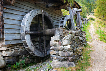 Detailed capture of the paddle wheel of a wooden water mill - Powered by Adobe