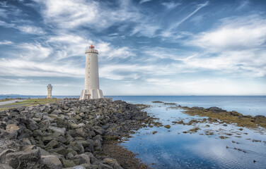 Akranes lighthouses on the west coast of Iceland. Bigger lighthouse is operational and smaller is...