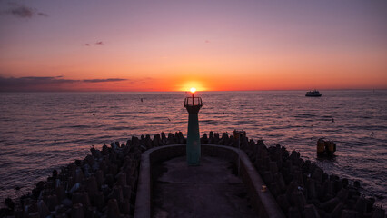 The beautiful harbour in the Polish town of Kolobrzeg at sunset on the Baltic Sea. Taken from a...