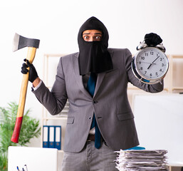 Male gangster stealing information from the office