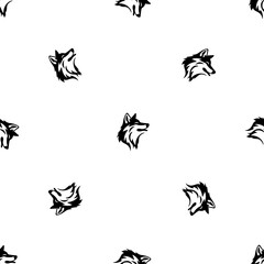 Seamless pattern of repeated black wolf heads. Elements are evenly spaced and some are rotated. Illustration on transparent background