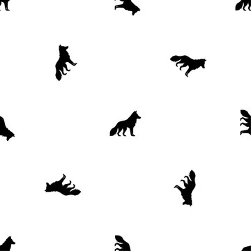 Seamless pattern of repeated black wolf symbols. Elements are evenly spaced and some are rotated. Vector illustration on white background