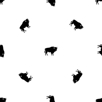 Seamless pattern of repeated black buffalo symbols. Elements are evenly spaced and some are rotated. Illustration on transparent background