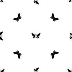 Seamless pattern of repeated black butterfly symbols. Elements are evenly spaced and some are rotated. Vector illustration on white background
