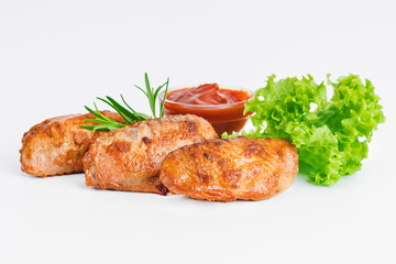 Chicken wings fried until half cooked, semi-finished product with fresh herbs on a white background. Fast food. Fast cooking.Quick cooking at home. Copy space.Fast homemade food.Raw chicken meat.