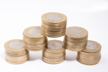Indian currency coin stack on white background