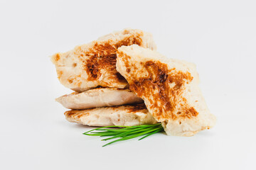 Fast cooking.Chicken fillets fried until half cooked, semi-finished product on a white background. Fast homemade food.Fast food. Quick cooking at home. Copy space.