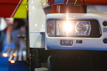 Close-up of a vehicle's headlight.
