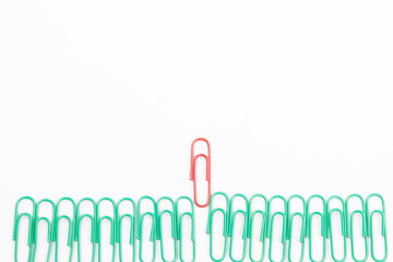 Top view of paperclip on white background with text space, unique concept