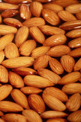 Wet almond texture background healthy food
