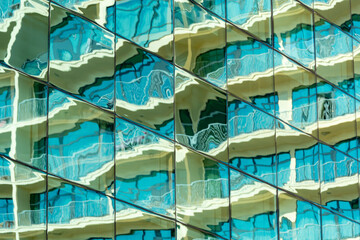 Reflection of architecture in large mirrored windows