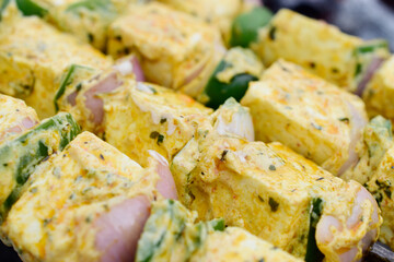 Closeup of paneer tikka preparing
