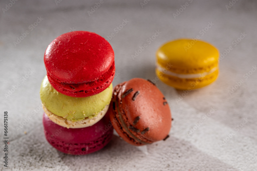 Wall mural delicious macaroons on the table. macarons cakes in different colors.