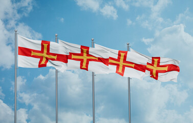 Guernsey four flags in row, multiple flags in line
