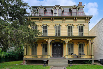 Fototapeta na wymiar ornate 19th century American house with full width porch