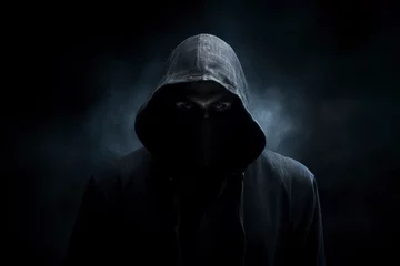 Deurstickers hooded man on dark background © Jorge Ferreiro