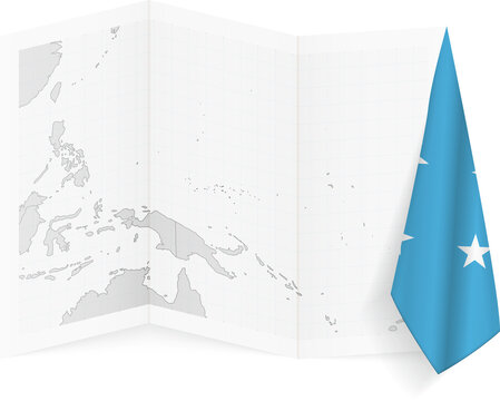 Micronesia grayscale map and hanging flag.