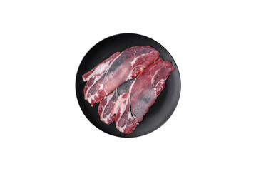 Slices of delicious smoked jamon or prosciutto with salt, spices and herbs