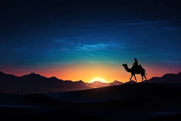 Rolgordijnen a silhouette of an arab man riding a camel in desert with sun in background © DailyLifeImages