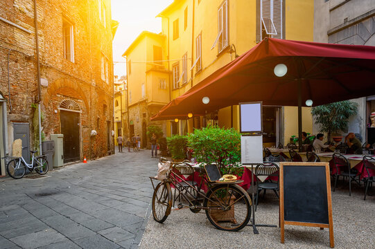 Fototapeta Old cozy street in Lucca, Italy
