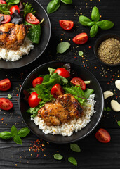 Baked balsamic chicken thighs with rice and vegetables