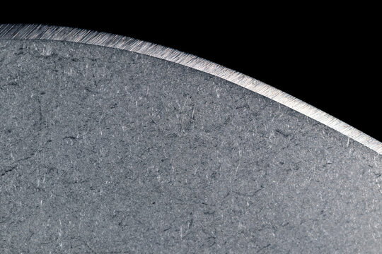 The blade of a sharp knife close-up. Knife blade made of high carbon steel
