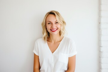 Naklejka premium Blond woman smile face portrait at home living room