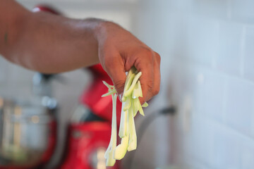 Man cooking in kitchen  hands close-up