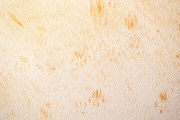Cat footprints or paw prints stains on concrete wall. Grunge and rough surface. Background and...