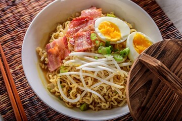 4K Image: Flavorful Ramen with Bacon, Boiled Egg, and Shredded Seaweed