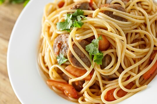 4K Image: Hearty Spaghetti with Savory Sausage, a Pasta Delight