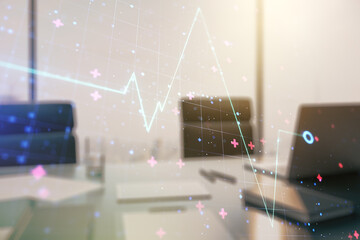 Creative abstract heart pulse hologram and modern desktop with pc on background, online medical consulting concept. Multiexposure