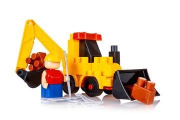 Children's construction set made from blocks of parts, an excavator with a bucket crane,...