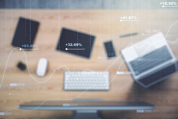 Multi exposure of stats data illustration on modern laptop background, computing and analytics concept
