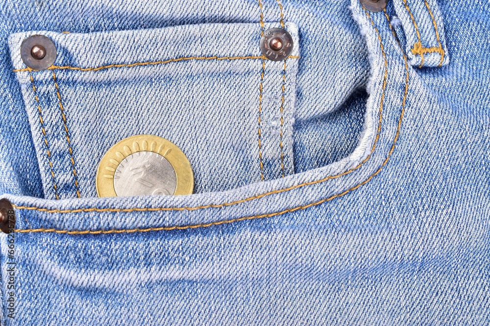 Wall mural top view of indian rupee coin in jean pocket