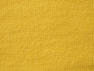 Factory textile fabric material surface yellow colored background