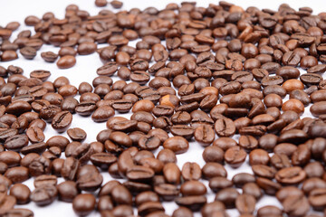roasted coffee beans scattered