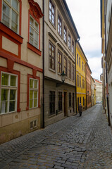 Fototapeta na wymiar Narrow historical colorful streets of Lesser Town in Prague, the Czech Republic
