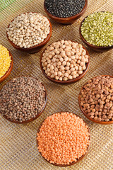 Uncooked beans and lentils in bowl