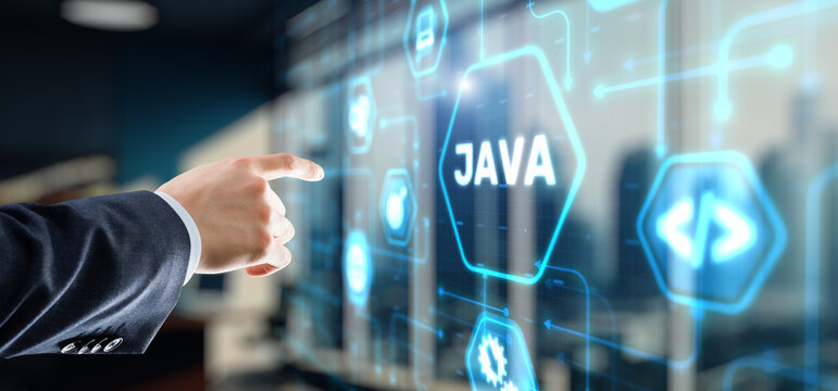 Businessman clicks Java programming language application concept on virtual screen