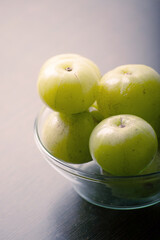 Closeup of fresh gooseberry in bowl
