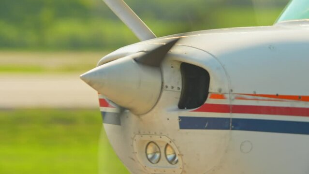 Flying pilot lessons and flight training for recreational pilot permit. Plane engine with working propeller. Departure warm up of a small aircraft. Private single engine airplane at Municipal Airport.