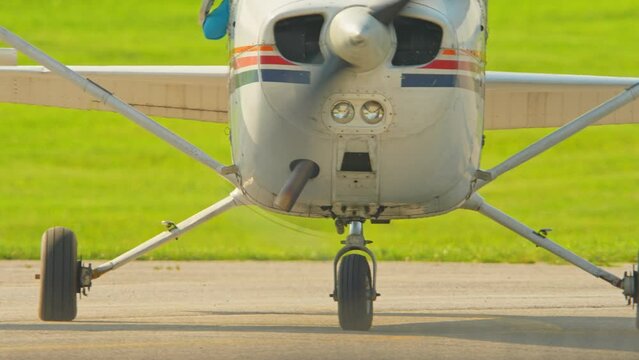 Flying pilot lessons and flight training for recreational pilot permit. Plane engine with working propeller. Departure warm up of a small aircraft. Private single engine airplane at Municipal Airport.