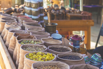 Bags of mixed spices and herbal tea in the street market. National cuisine and cooking concept....